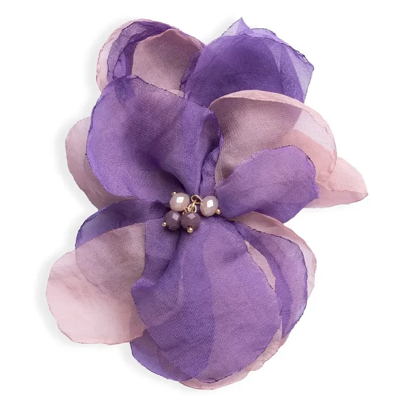 MYA ACCESSORIES | Spilla a forma di fiore in tessuto viola/beige